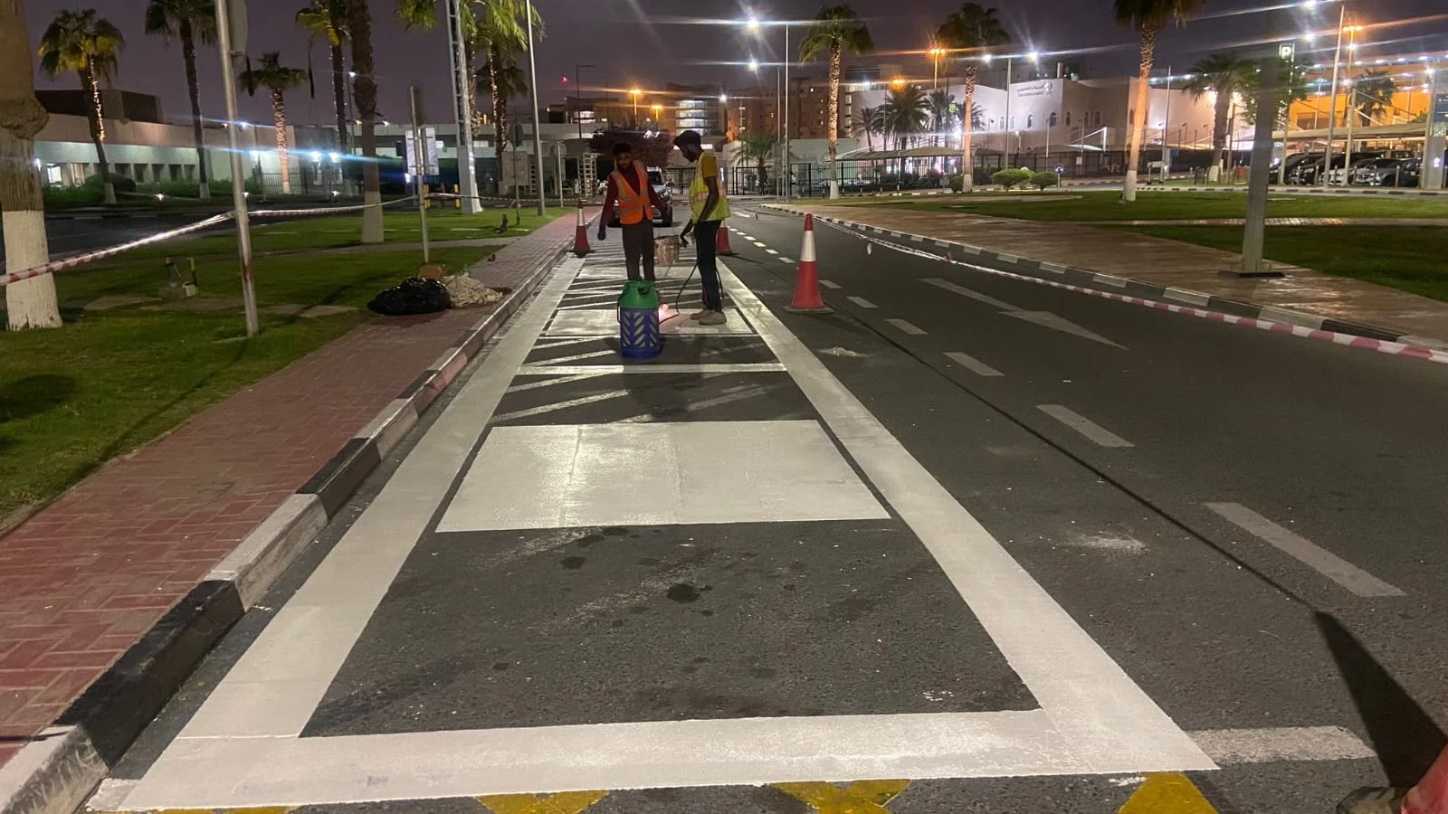 High-visibility road marking signs and traffic regulatory signage in Qatar